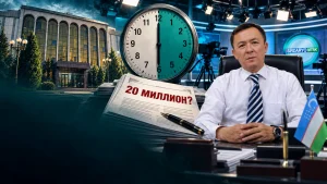 Столда ўтирган киши, орқада соат, газета ва Сирдарё телерадиоканалига оид декорация. Газетада катта ҳарфда '20 миллион?' деб ёзилган.